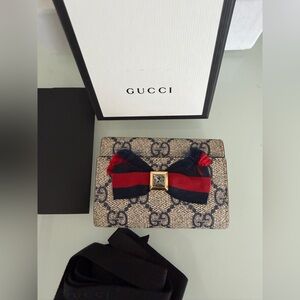 Gucci Beige and Navy keyring with Red Bow
